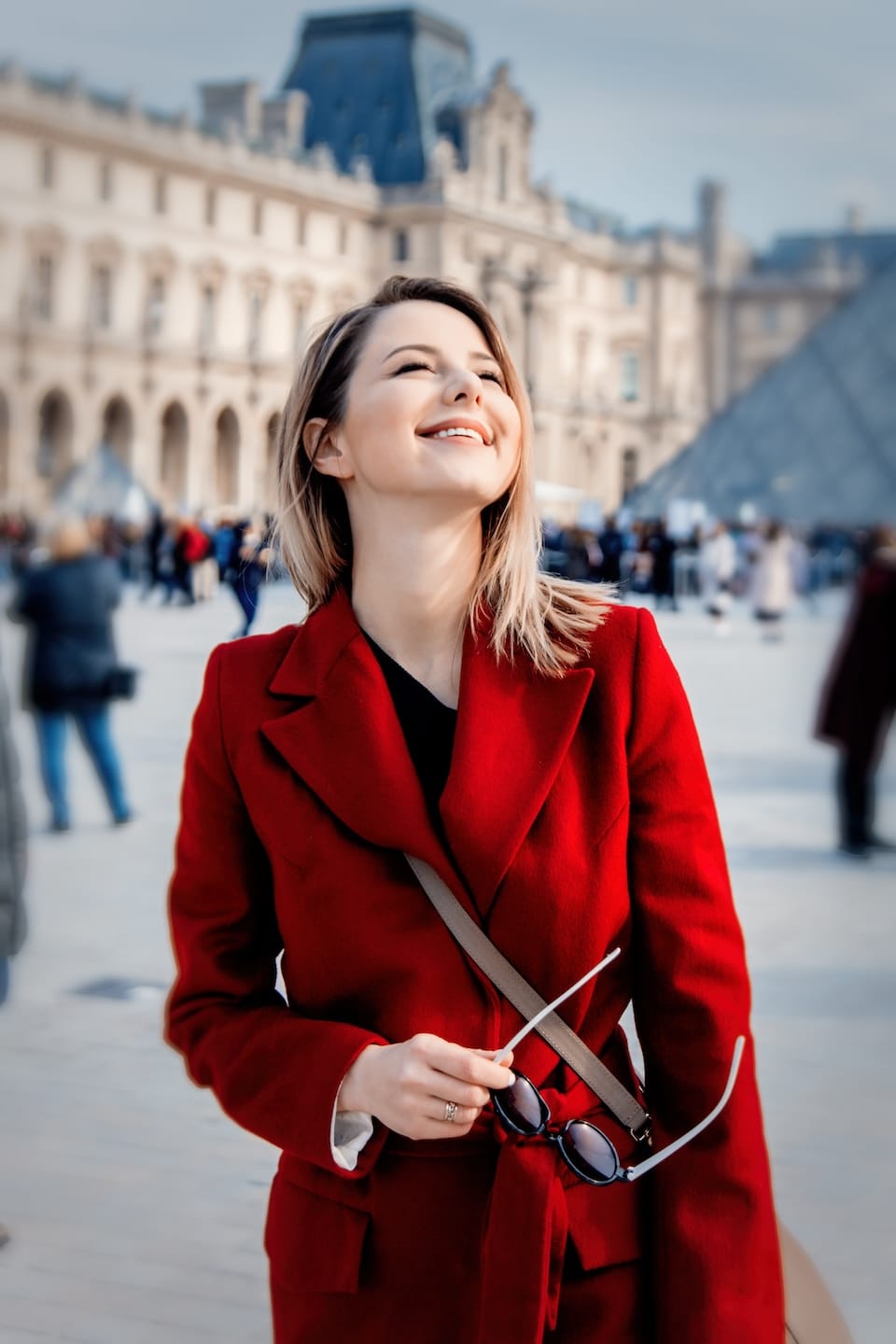 redhead girl in red coat and bag on parisian stree 2023 11 27 05 19 29 utc